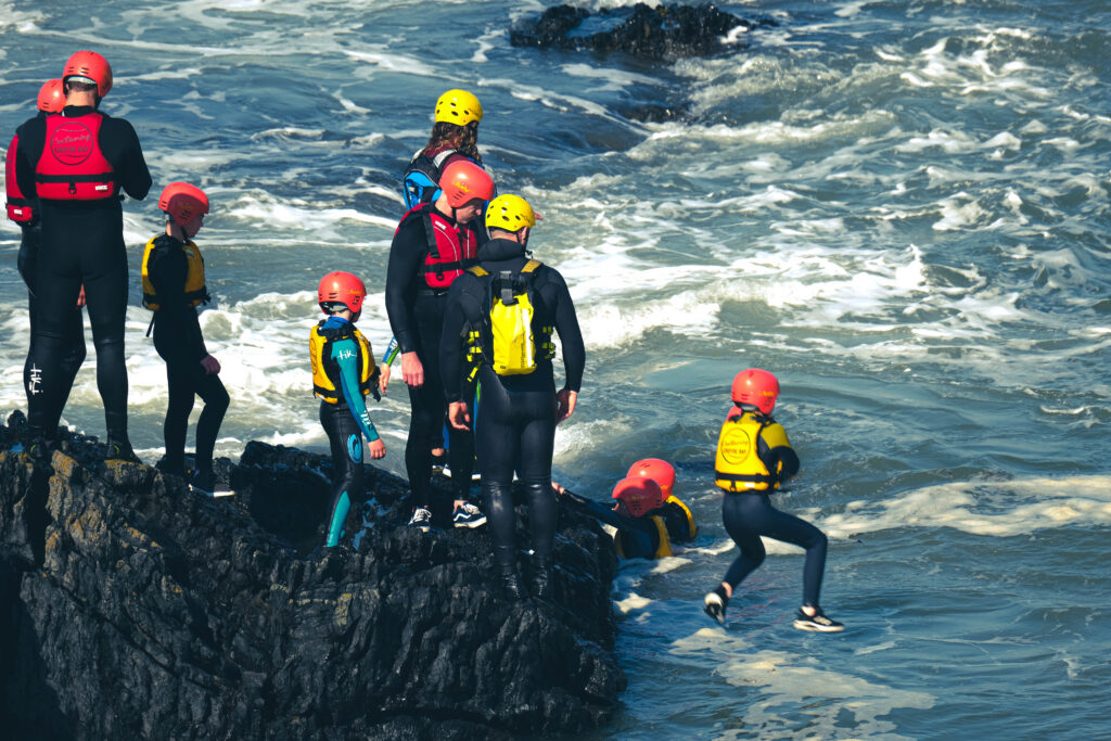 Coasteering with Surfing Croyde Bay at Baggy Point, Croyde Bay, North Devon, UK