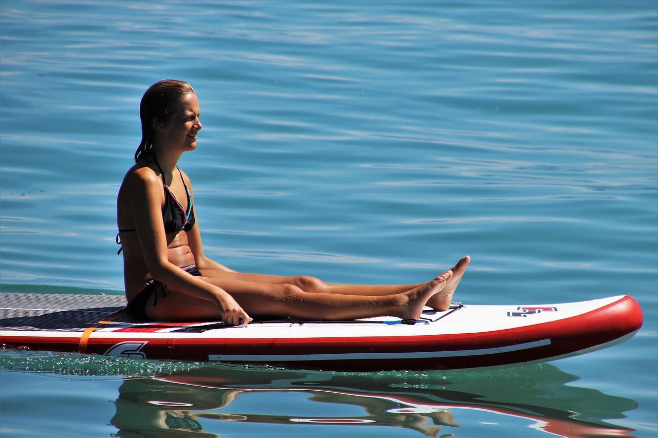 girl, sup, on the water