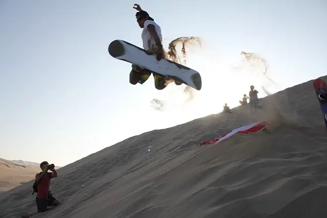 Experience the Thrill of Sandboarding in Peru